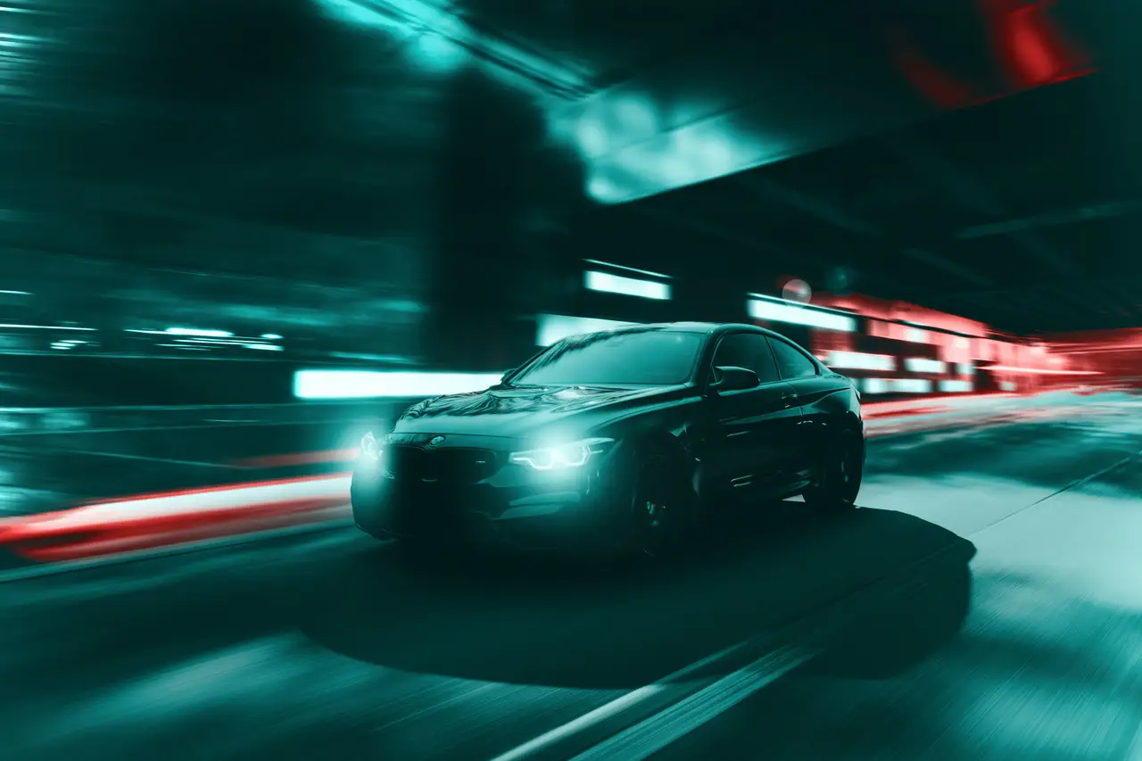 Dark performance car in a Nordic night